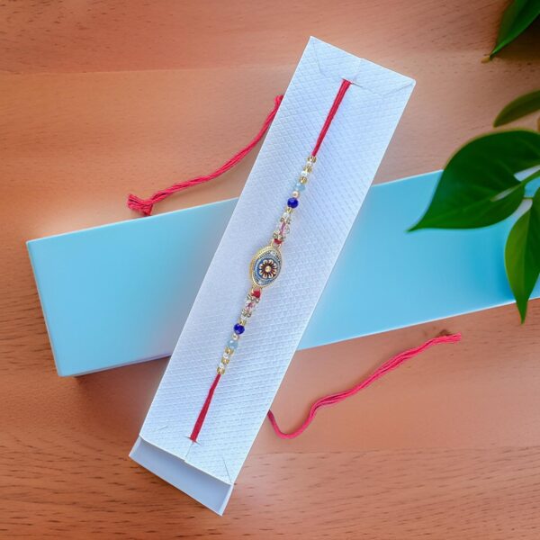 Elegant Brass Golden Rakhi Bracelet for Brother Traditional Raksha Bandhan Rakhi with Moti Beads - Image 2