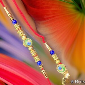 Elegant Morpankh in Golden Ring Rakhi Set for Bhai Bhabhi