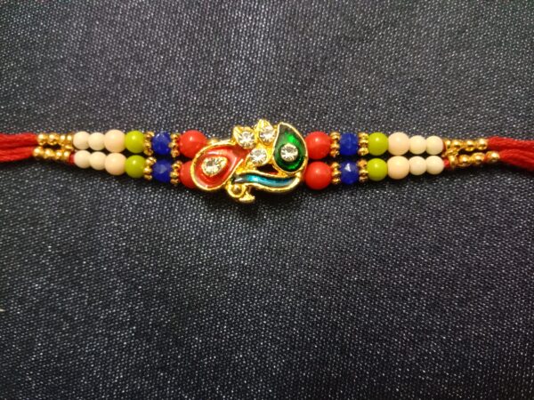 Peacock Shape Multicolour Diamond Rakhi | Traditional Bracelet for Bhaiya