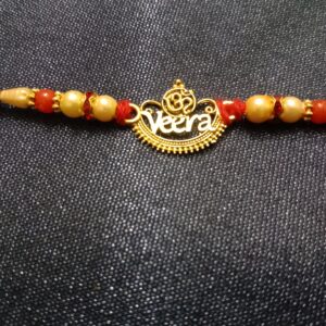 Gold Om with Veera Pendant Rakhi Bracelet – Traditional Gift for Brother